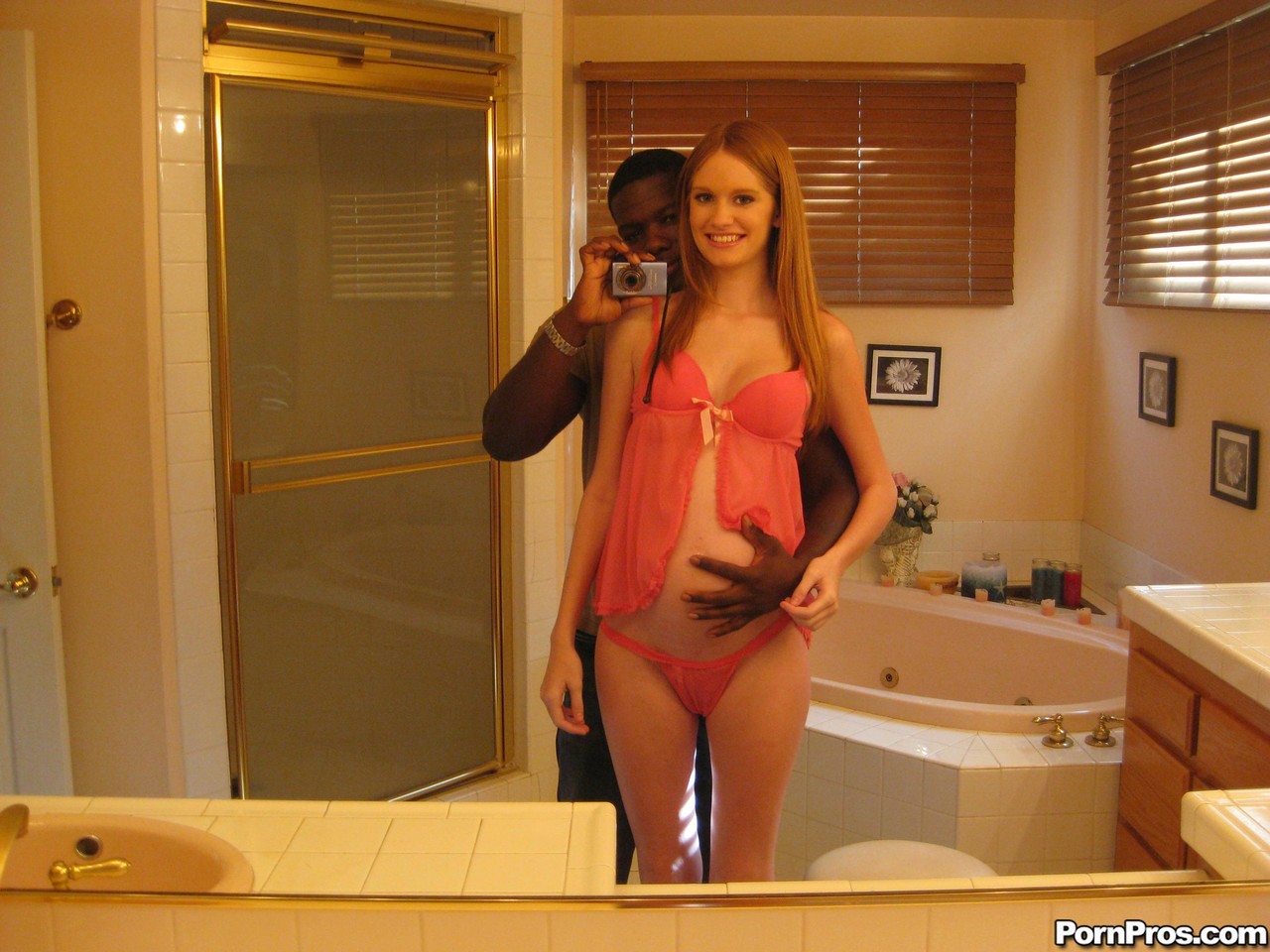 Pregnant redhead Layla Exx poses for the photoshoot with black guy porn photo #428844081