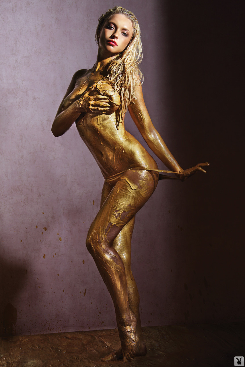 Busty supermodel April Summers posing covered in golden bodypaint porn photo #429073427