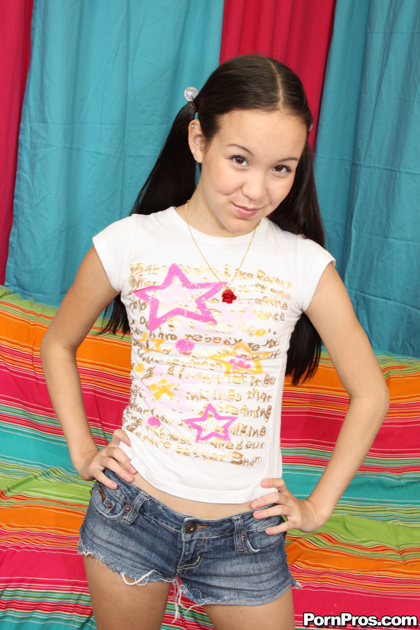 Tiny teen with ponytails Amai Liu shows off her tiny tits & fingers her pussy zdjęcie porno #422640672