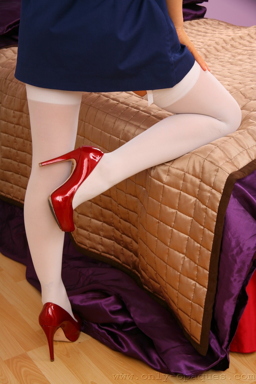 Naughty stewardess Gemma Massey poses in white stockings after losing uniform foto porno #425766040