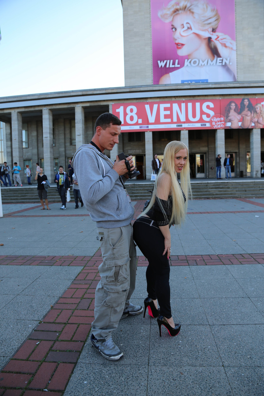 Blonde German chick Celena Davis flashes big tits and ass in public square foto porno #429106895