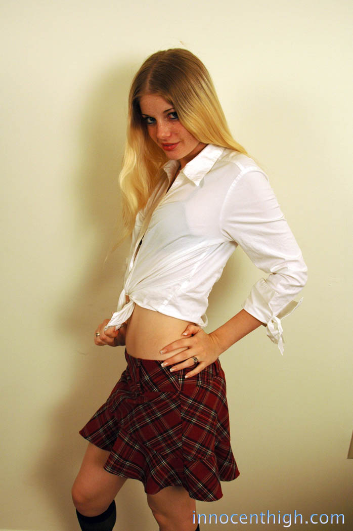 Innocent-looking blonde schoolgirl Charlotte Stokely teases with her uniform porn photo #425694524