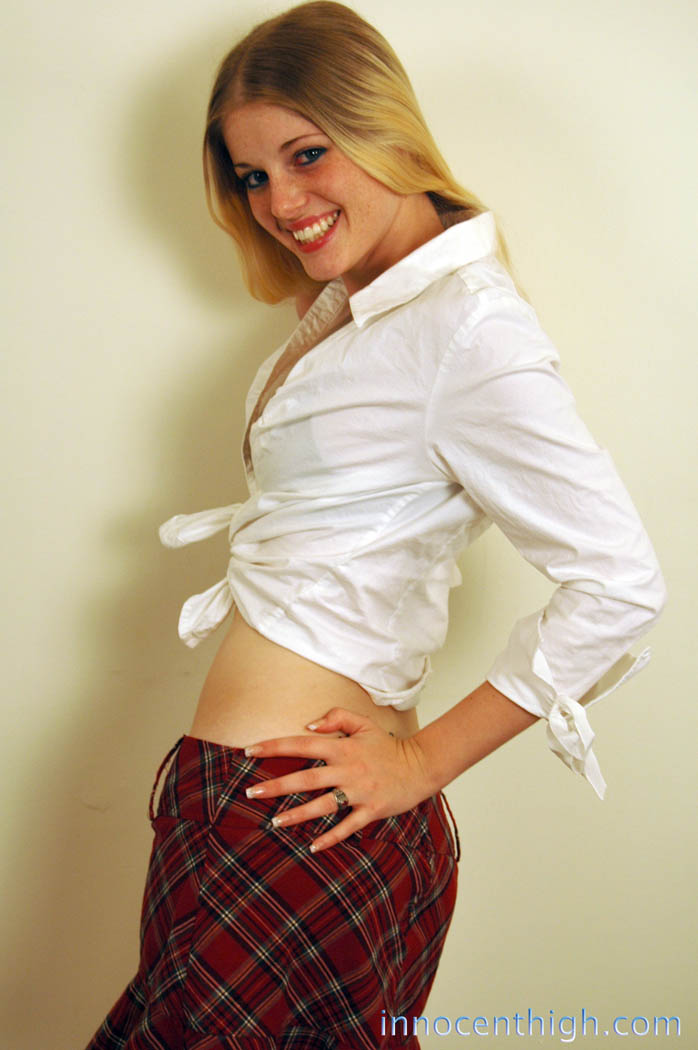 Innocent-looking blonde schoolgirl Charlotte Stokely teases with her uniform porn photo #425694528