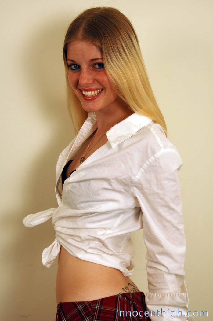 Innocent-looking blonde schoolgirl Charlotte Stokely teases with her uniform porn photo #425694529