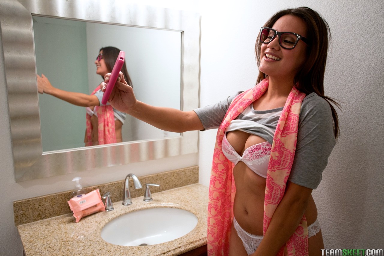 Glasses clad teen Selma Sins reveals her nice natural tits to take sexy selfie porno fotoğrafı #426090583