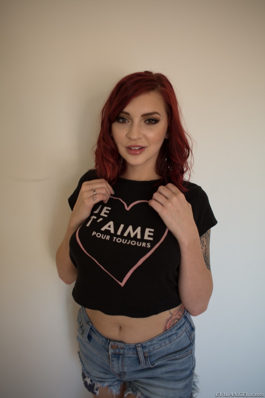 Redhead babe Amber Ivy bares her natural tits and takes off her tight shorts порно фото #425433303