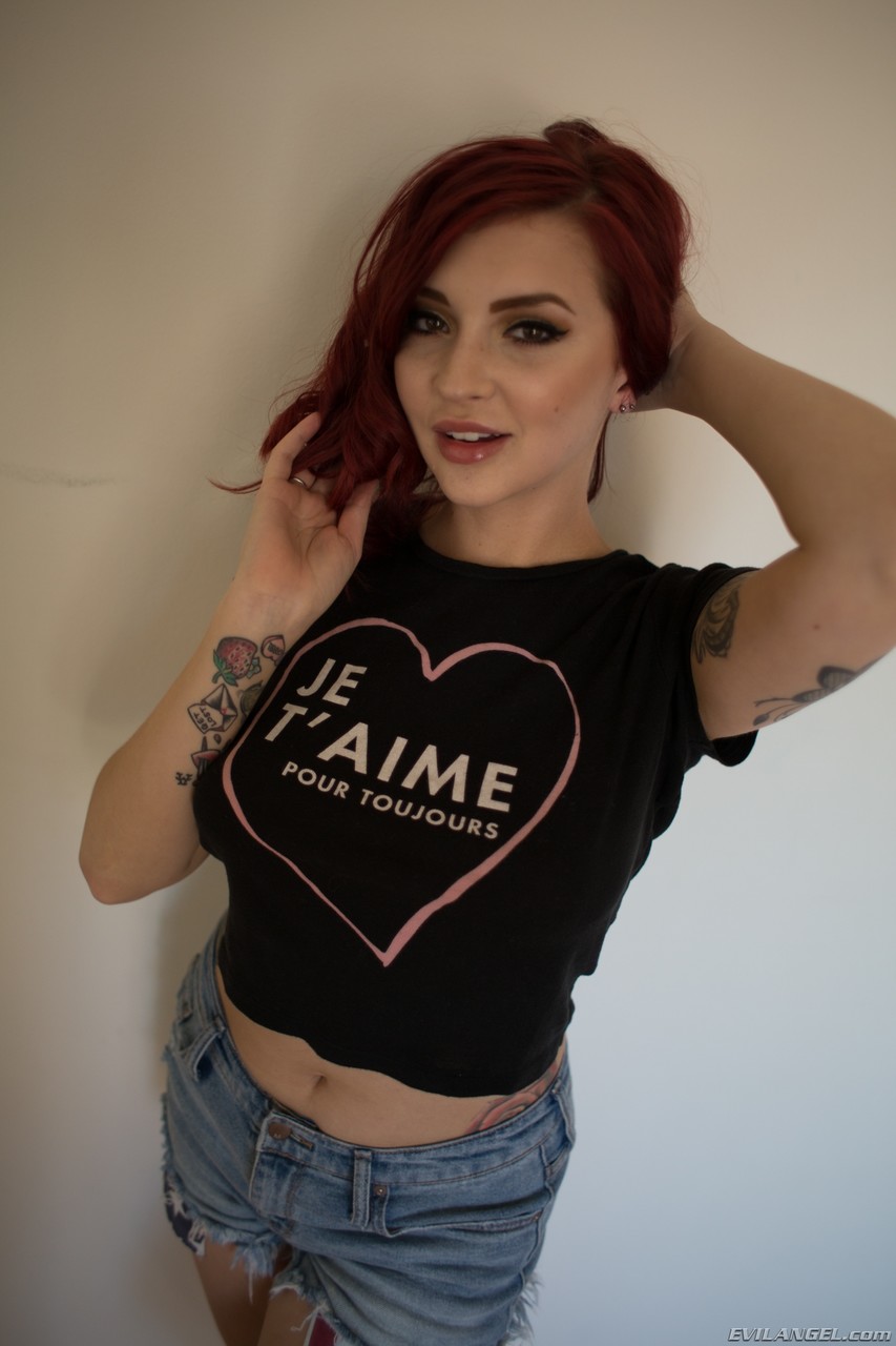 Redhead babe Amber Ivy bares her natural tits and takes off her tight shorts порно фото #425433307