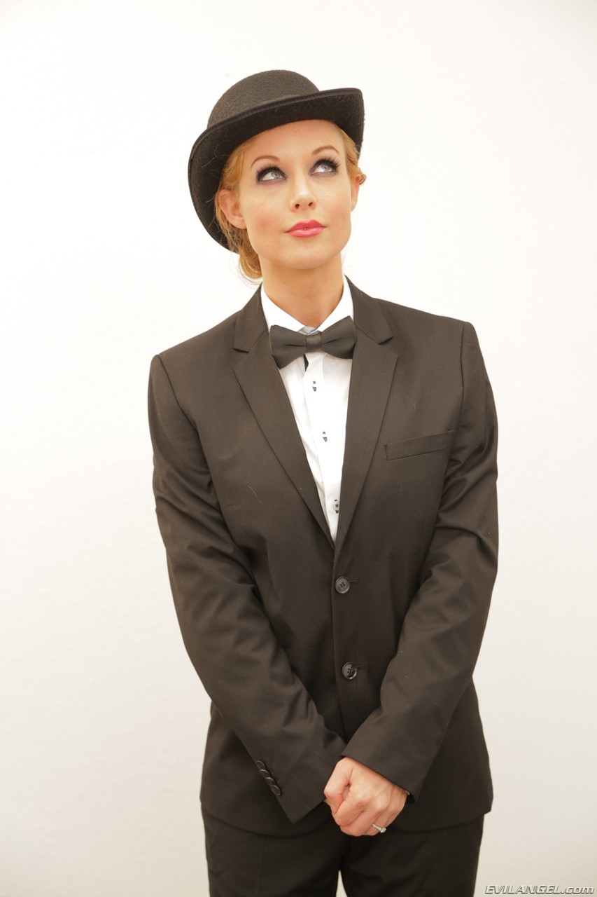 Blonde pornstar Kayden Kross posing in a suit and with a hat at home porn photo #426426409