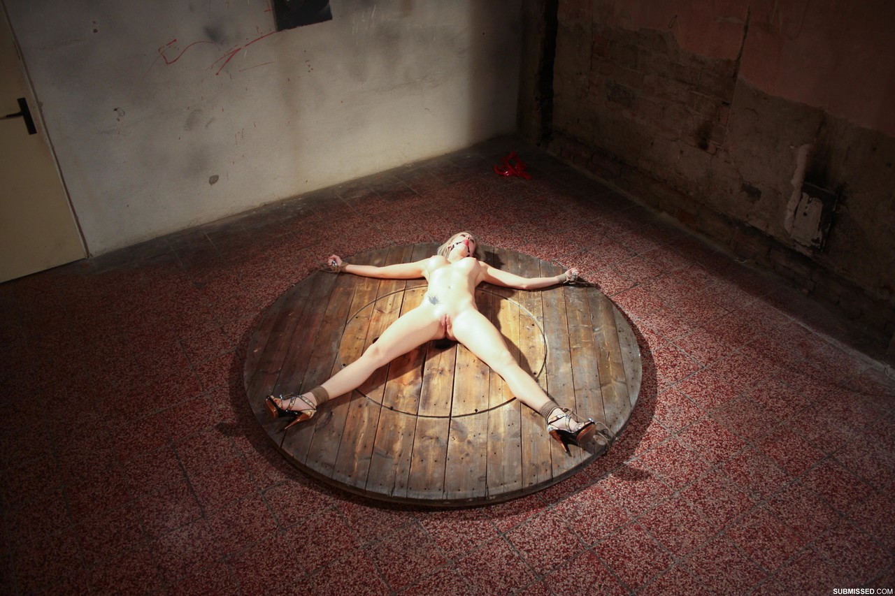 Naked Victoria lays like a starfish being tied to the round wooden scene photo porno #428249706 | Submissed Pics, Victoria, Bondage, porno mobile