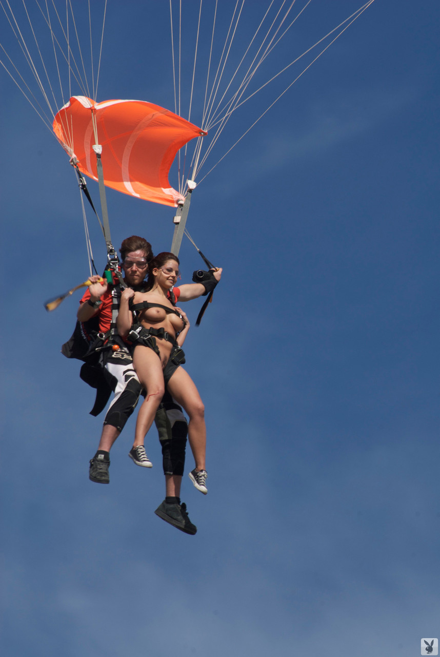 Models with stunning curves having fun naked on water zip lines and parachutes порно фото #428604673