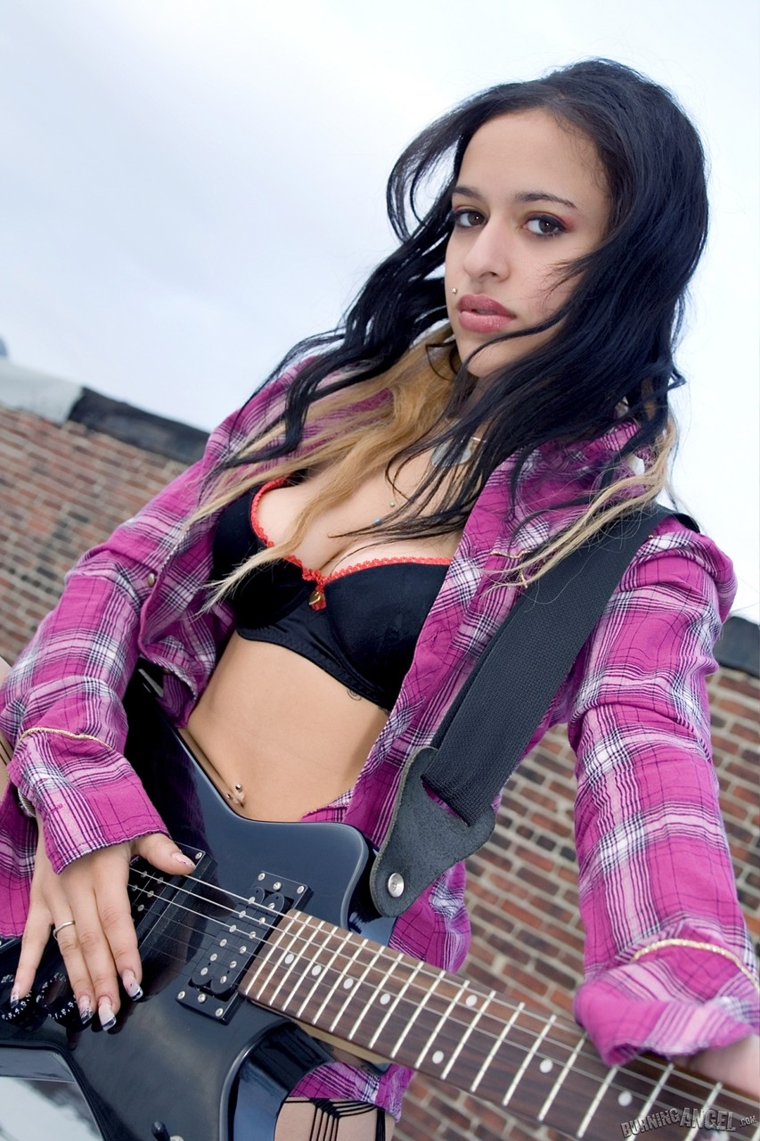Hot tattooed Nicola plays a guitar & does a sizzling striptease on the rooftop porno fotky #428514561