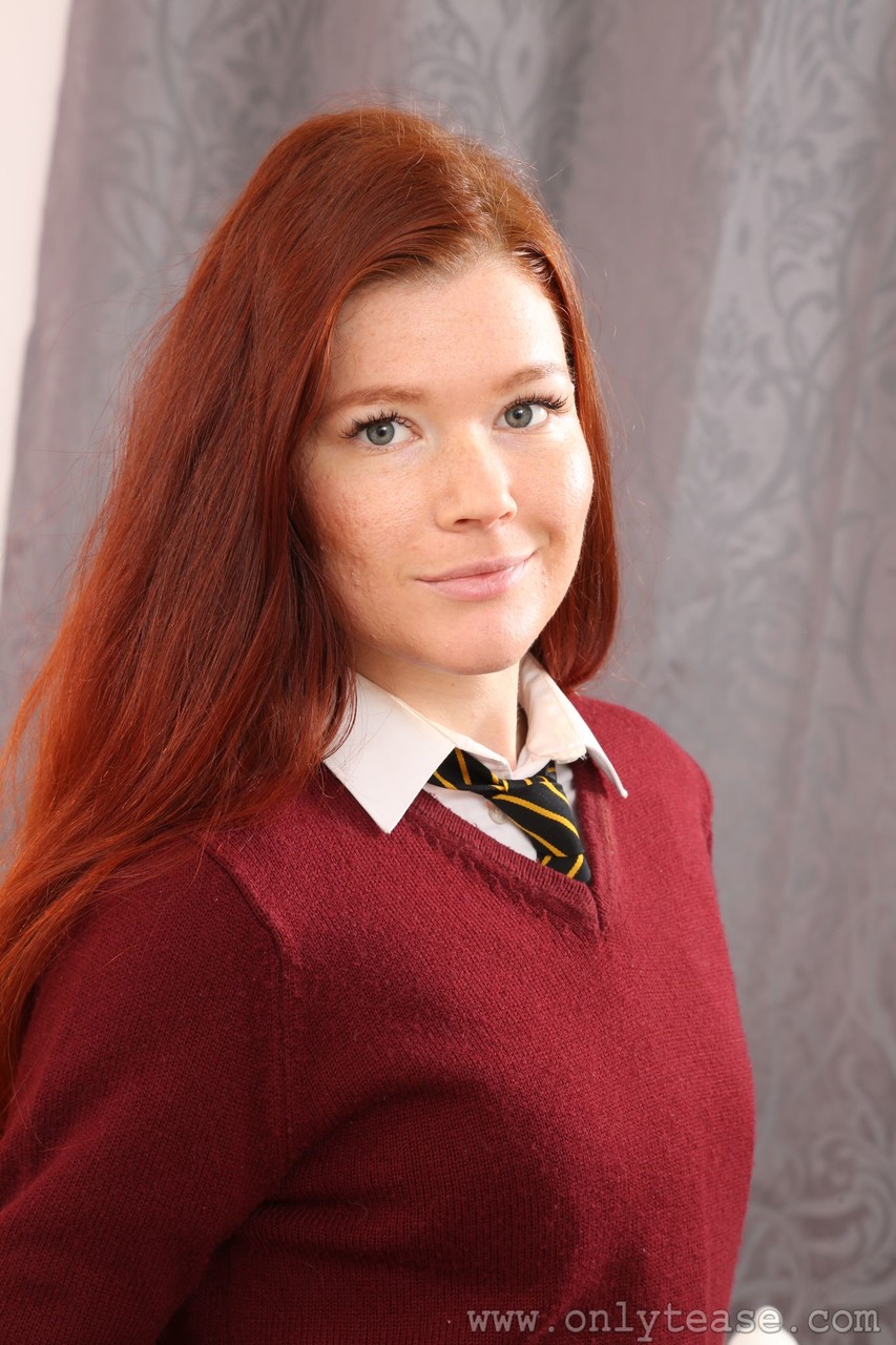 Redhead teen Mia S doffs her school uniform and poses topless in her dorm room foto porno #424224873