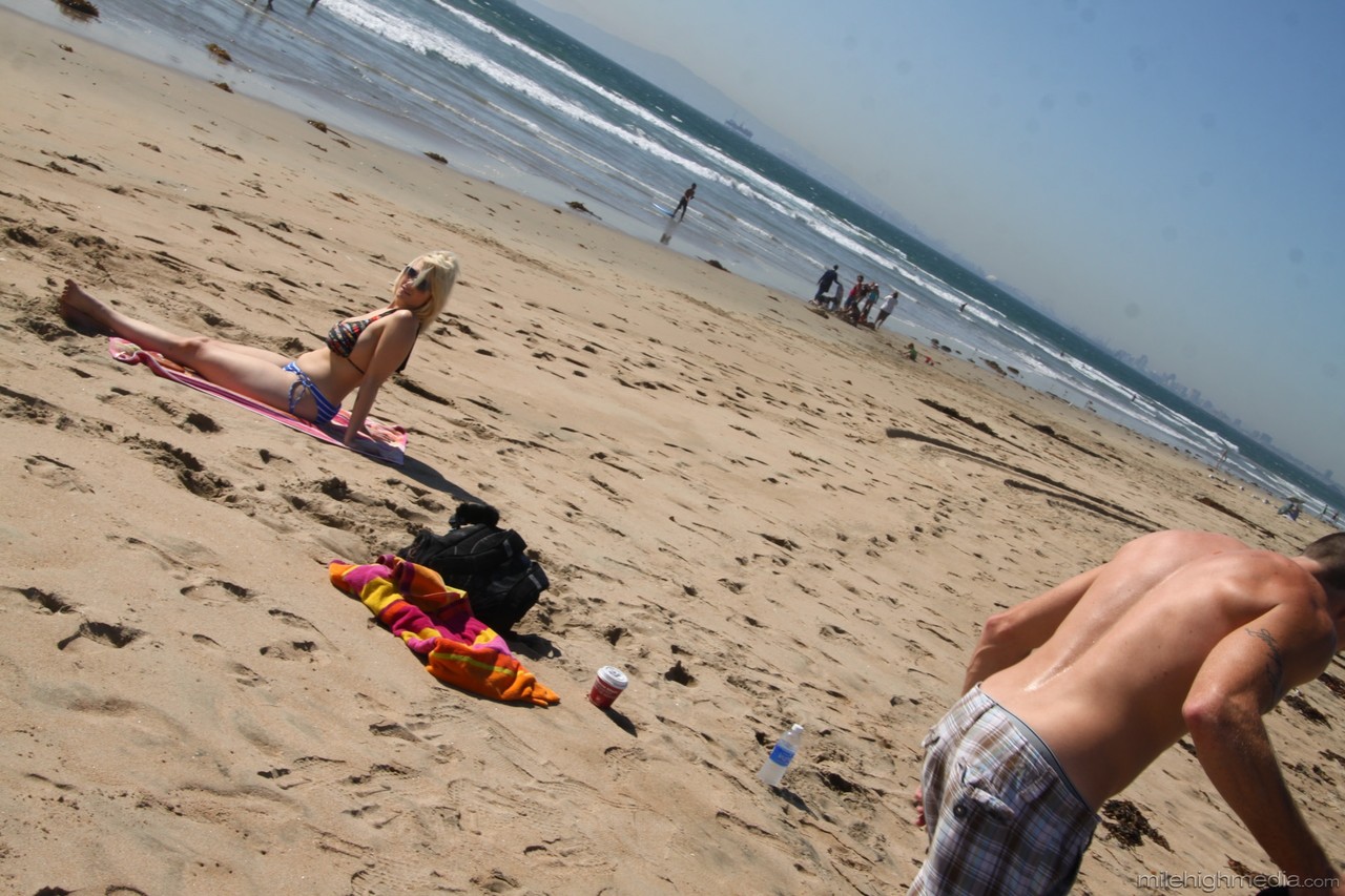 Chubby blonde sunbather Siri flaunts her big tits in a bikini on the beach porn photo #422689890