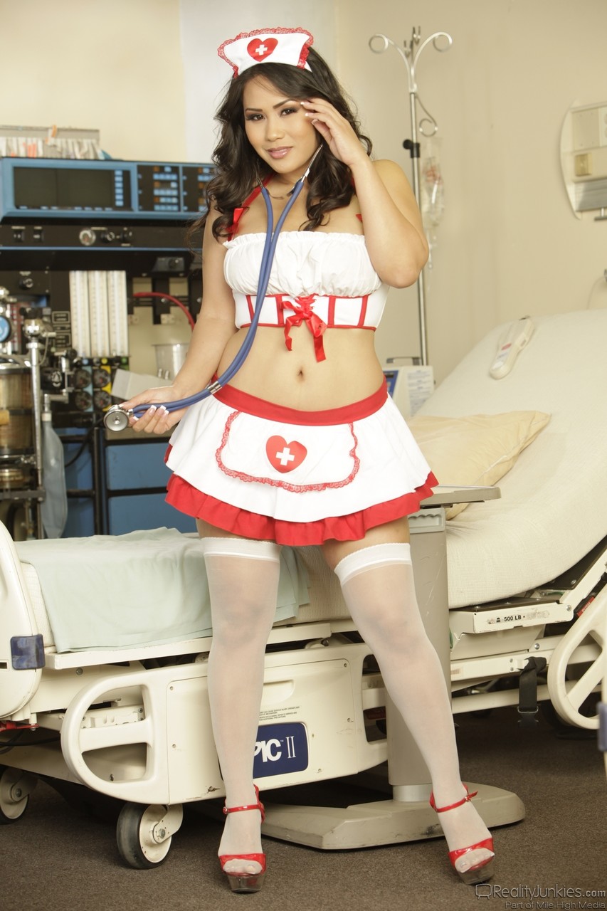 Asian Nurse Jessica Bangkok Sheds Uniform Flaunts Tits Clit In Pantyhose