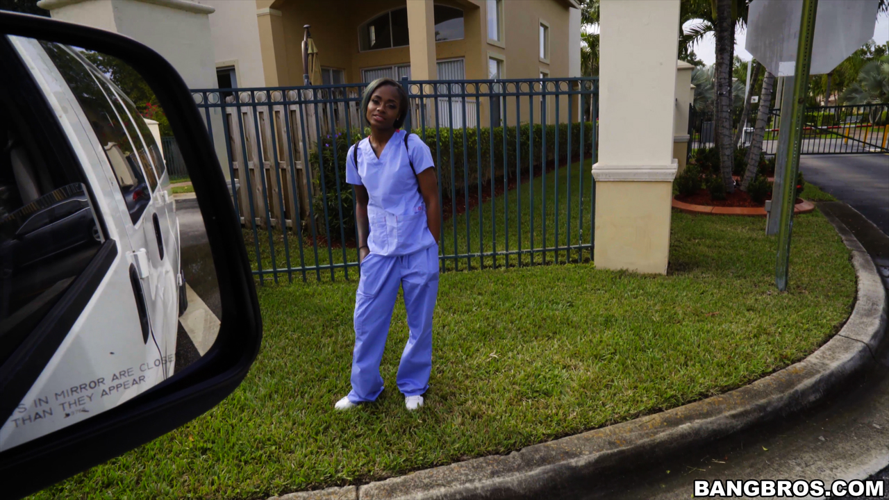 Lexxi Deep, a white knob-throated health care girl from Ebony, is riding in the back of a van.