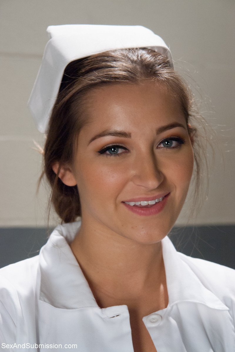 Gorgeous nurse with a nice butt Dani Daniels strips and poses in high heels foto porno #424018350