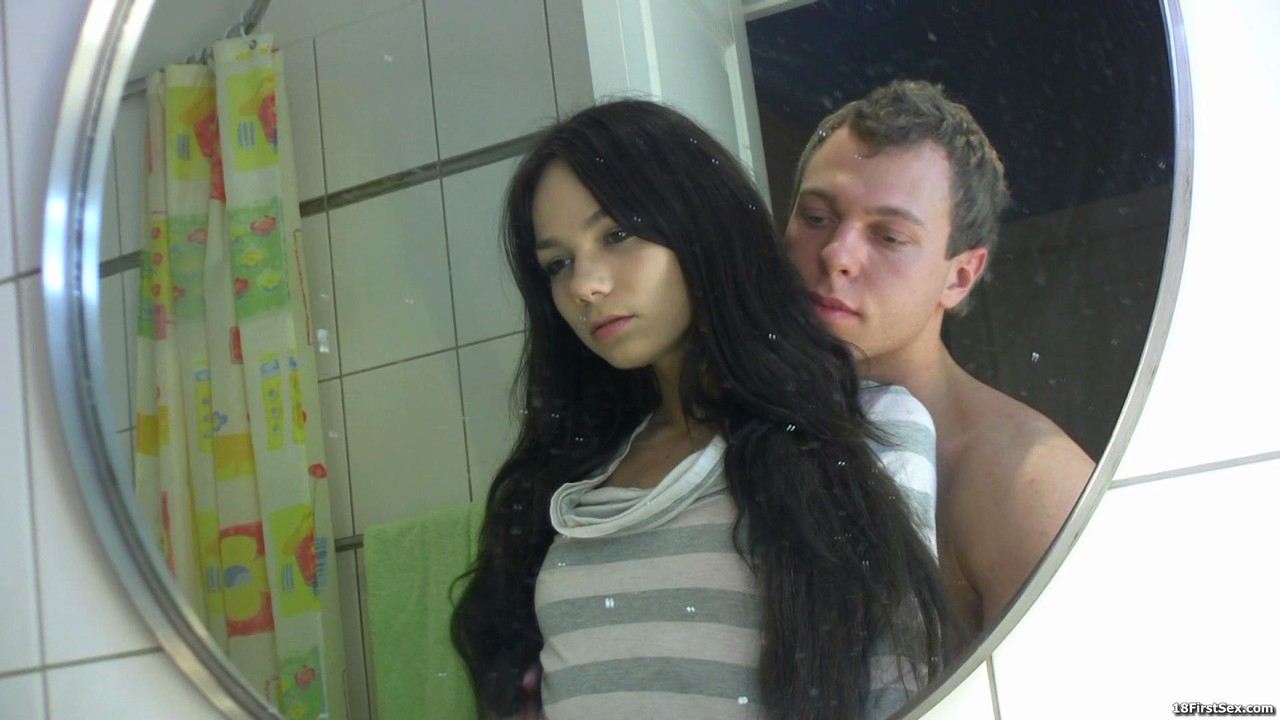 Brunette teen beauty Karina gets fucked from behind by her BF in the shower