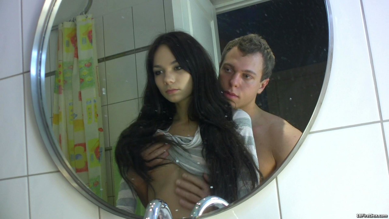 Brunette teen beauty Karina gets fucked from behind by her BF in the shower