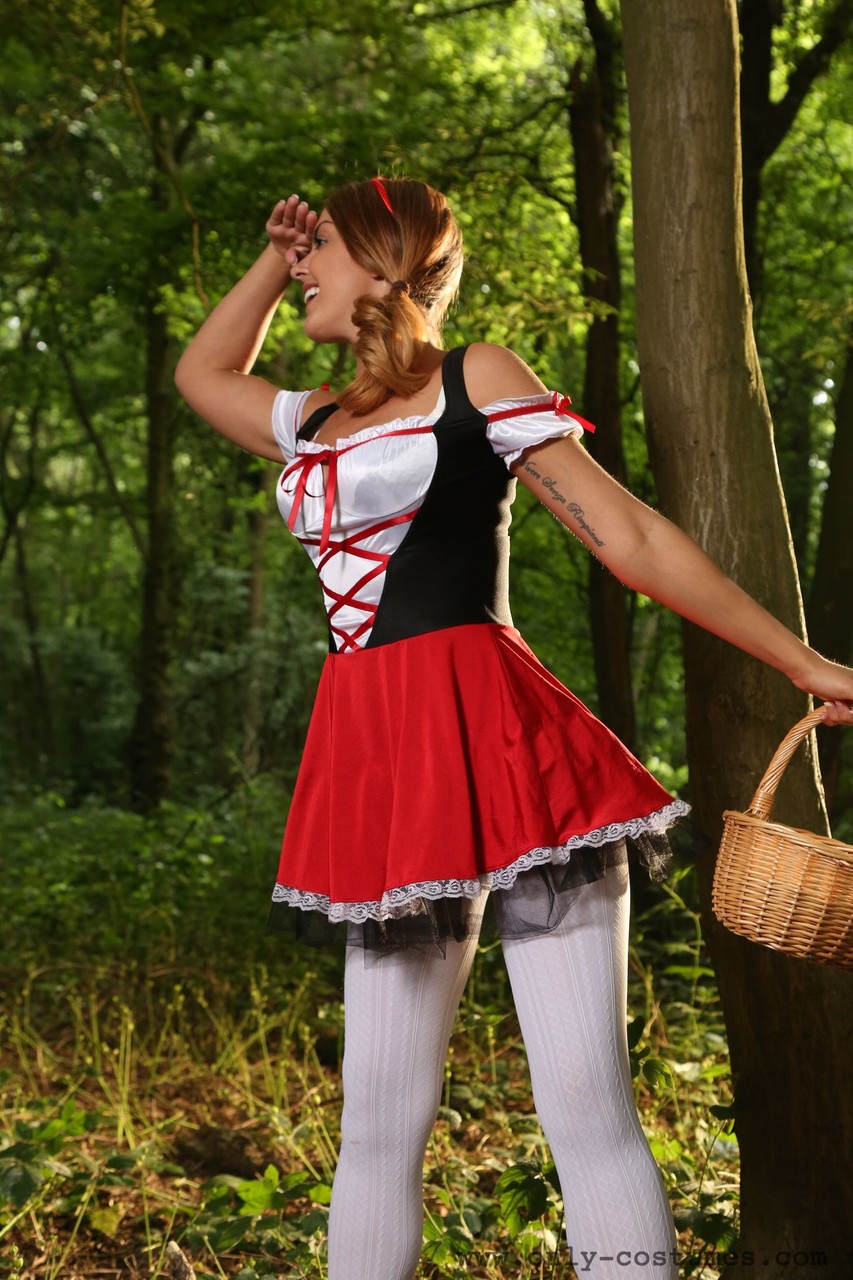 Sexy Little Red Riding Hood Gemma Jack teases in pantyhose in the forest foto porno #423154658