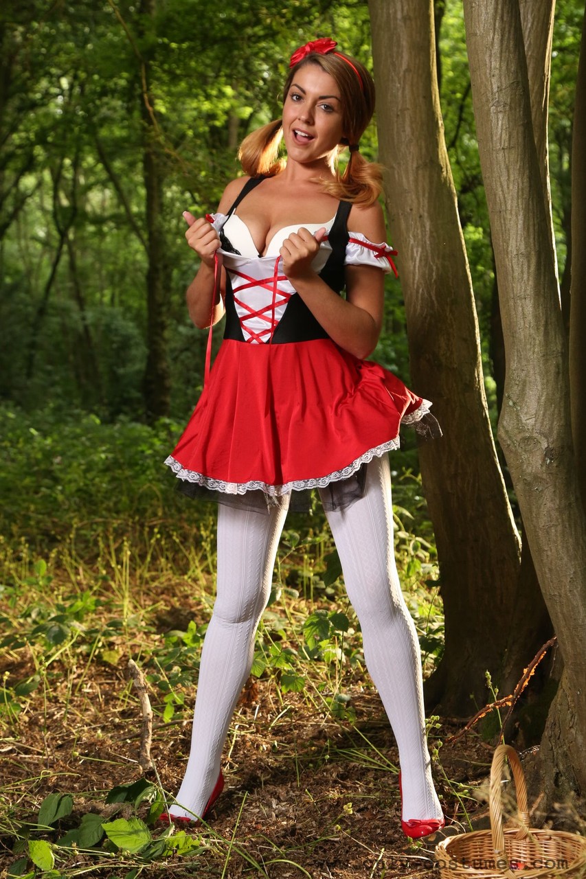Sexy Little Red Riding Hood Gemma Jack teases in pantyhose in the forest porn photo #423154664