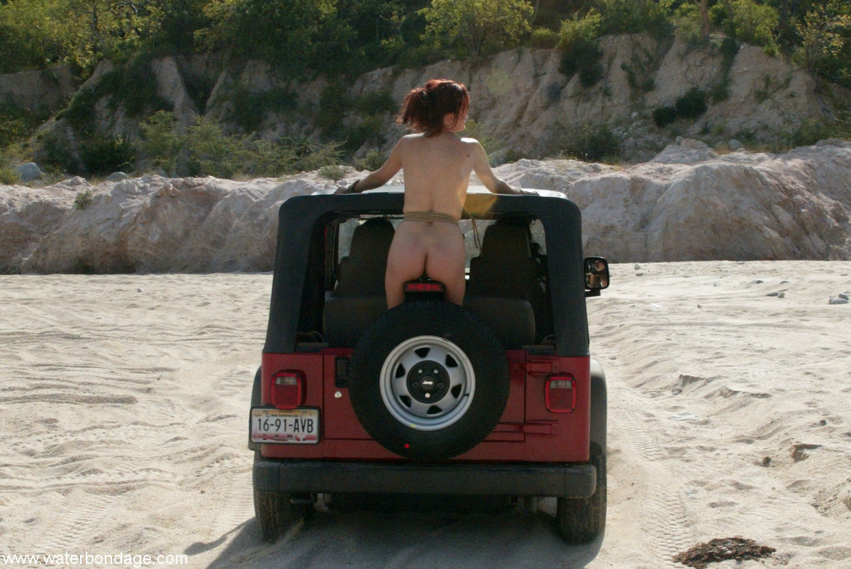 Sexy MILF with amazing breasts Sasha Monet gets tied naked to a Jeep foto porno #428615997