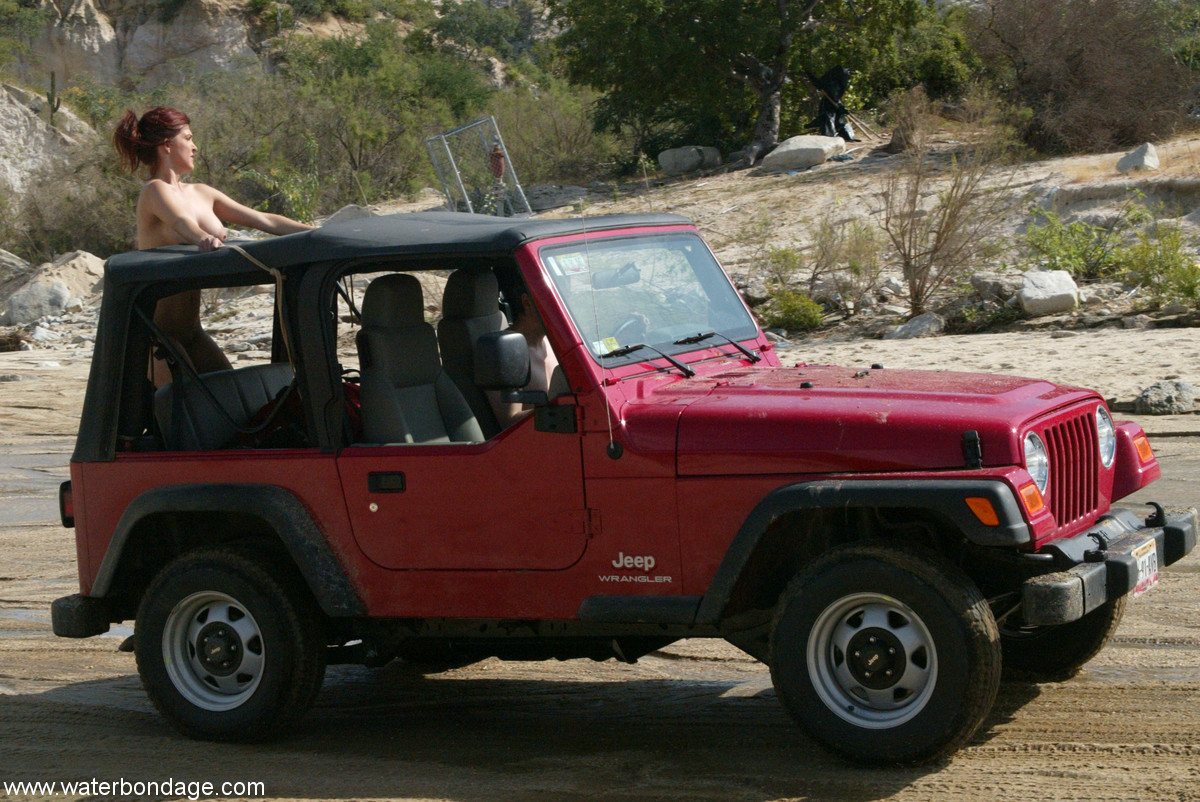 Sexy MILF with amazing breasts Sasha Monet gets tied naked to a Jeep porn photo #429024053