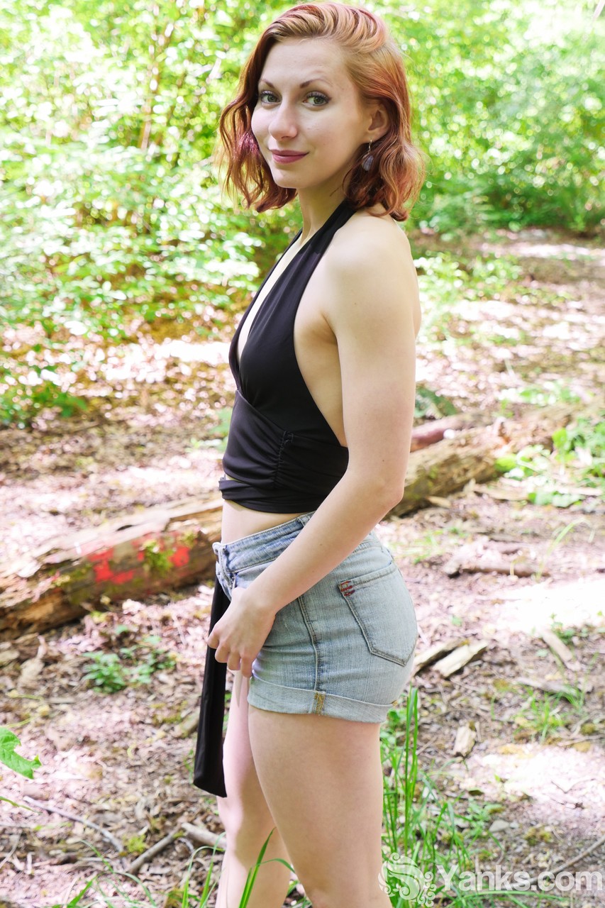 Sweet looking redhead teen Anja showing off her tiny tits in the forest porn photo #428697653