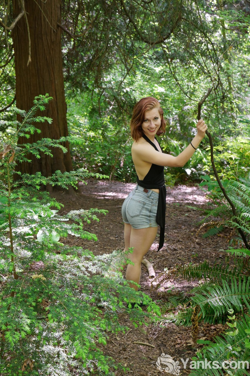 Sweet looking redhead teen Anja showing off her tiny tits in the forest porno foto #428697655