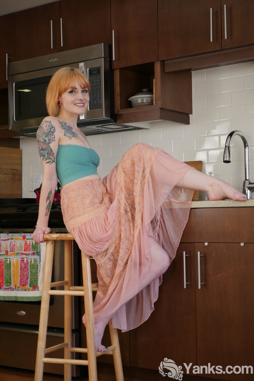 Alt model with a tattooed body Danae Kelley fingering her pussy in the kitchen foto porno #423319428