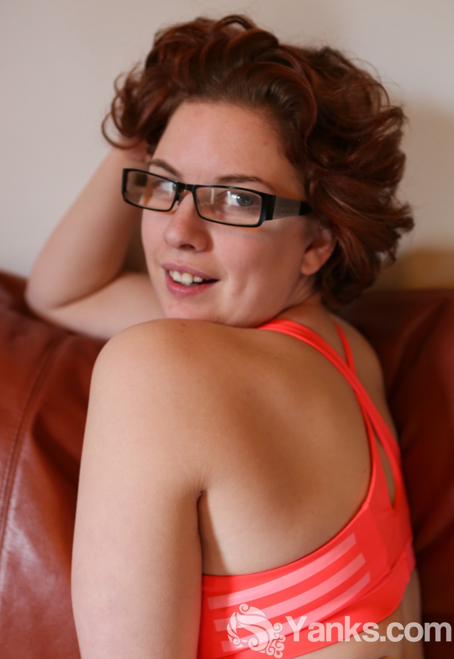 Glasses-clad redhead Ryder Sparks with pale big tits spreads naked on the sofa porn photo #428350185