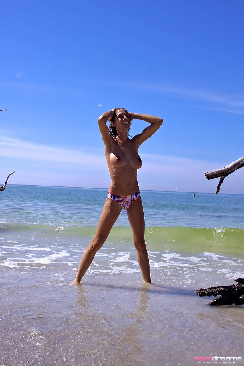Teen with beautiful tits Michelle enjoying naked water play on the beach foto porno #428081942