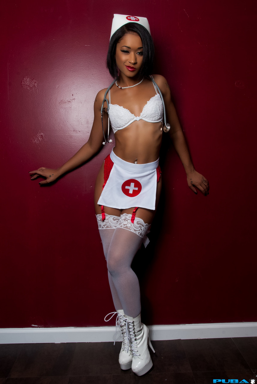 Ebony nurse with a slim figure Skin Diamond flaunts her titties in lingerie zdjęcie porno #427172252