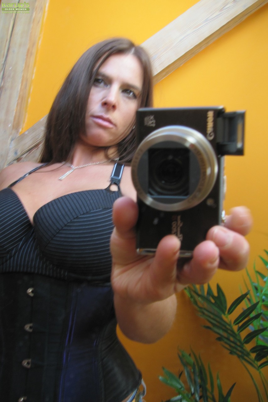 Sexy skinny mature Susanne takes selfie of floppy big tits while rubbing pussy porn photo #429037462