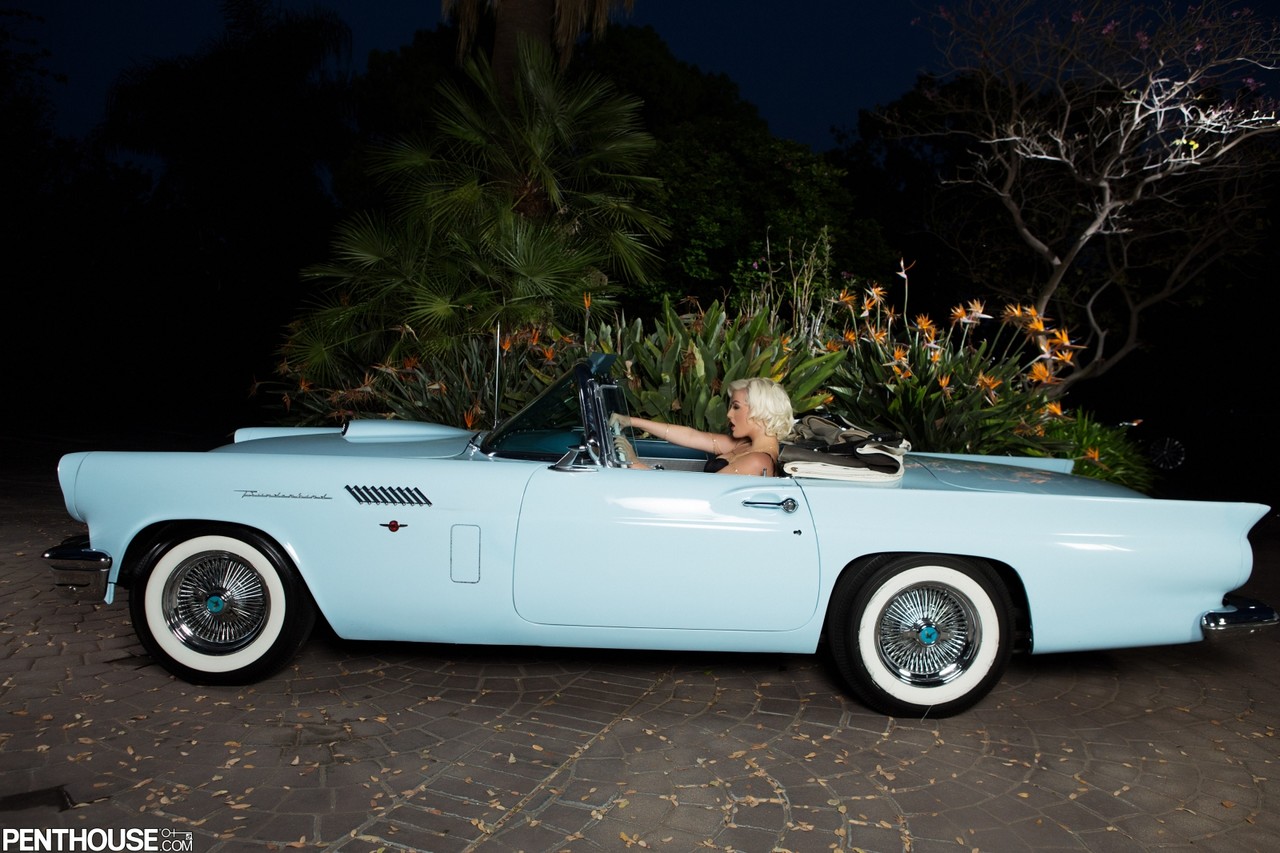 Platinum blonde centerfold Jenna Ivory strips naked and poses in a classic car porn photo #428454311
