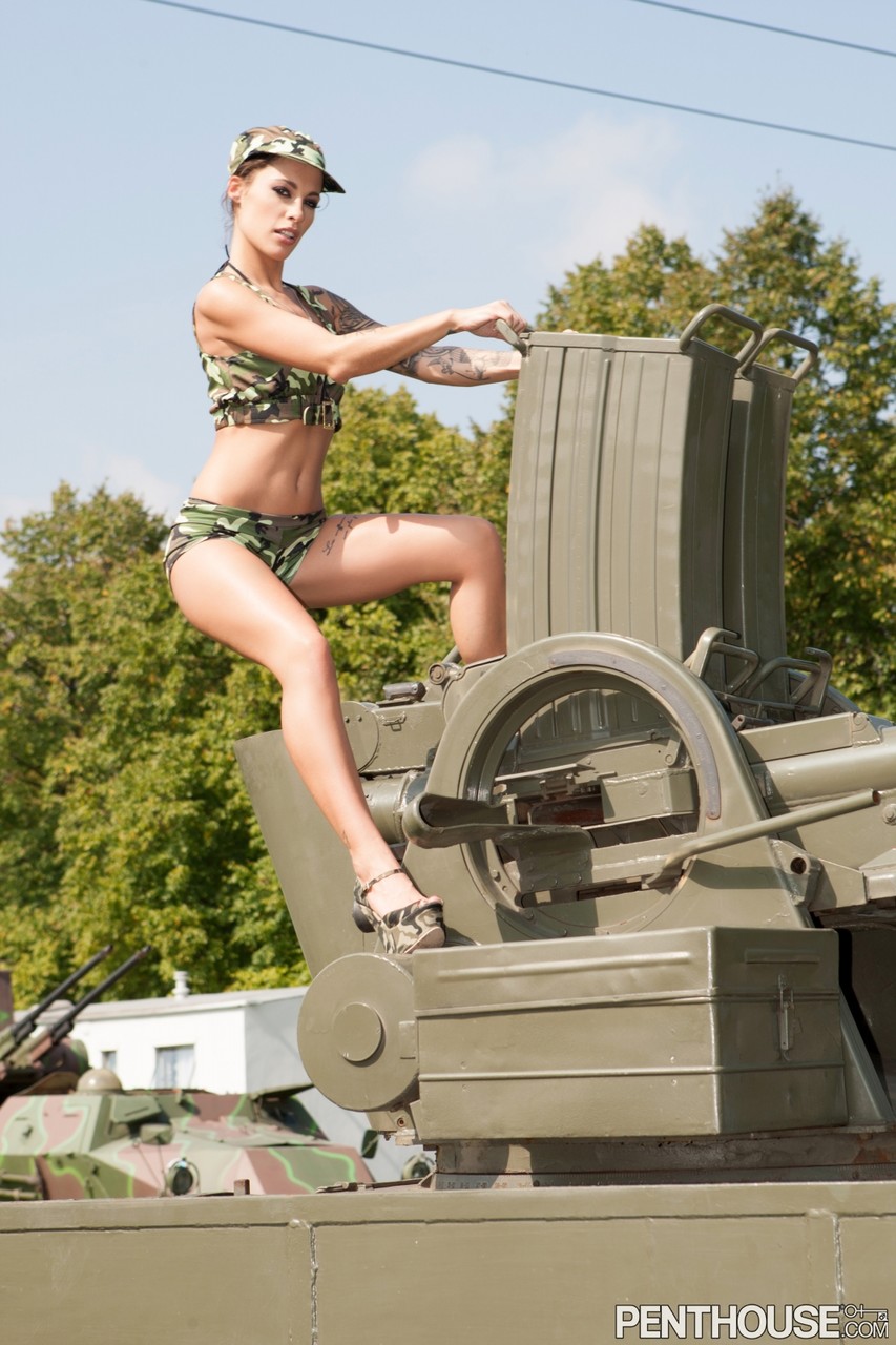 Kinky army woman Nikita Bellucci enjoying an outdoor FMM 3some on a tank porno foto #422497204