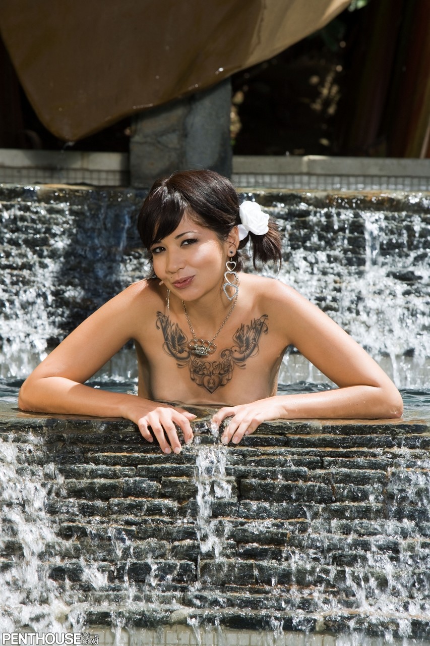 Brunette babe Coco Velvett strips & poses naked in a Buddhist temple garden photo porno #428608094