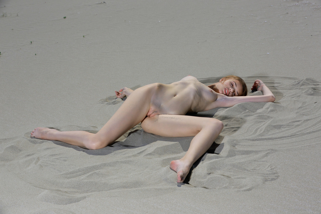 Adorable Russian model Elle Tan shows her pink holes while posing in the sand photo porno #422682774
