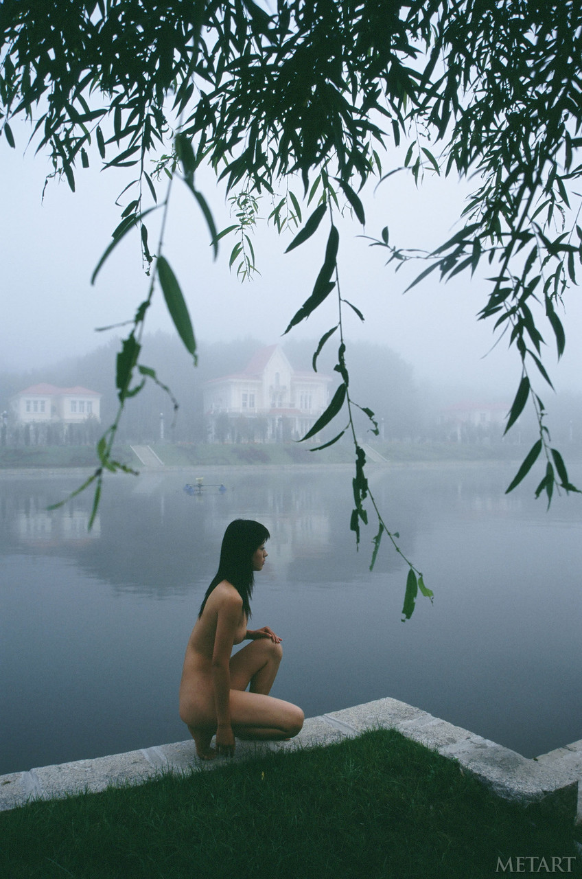 Glamorous Asian Wu Weiquiposes nude while taking an erotic outdoor stroll porn photo #424162957