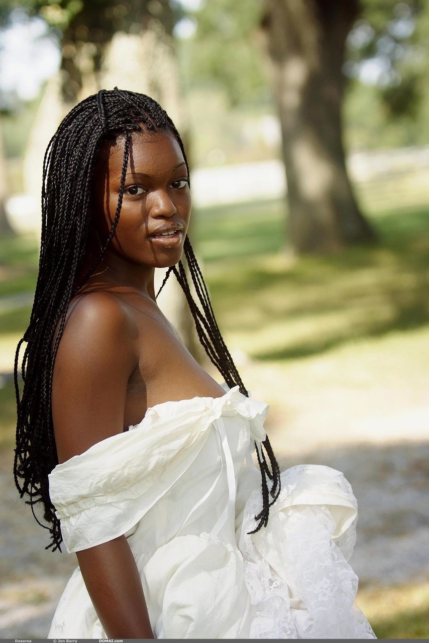 Ebony With Amazing Big Tits Deserea Doffs Her Dress And Poses Outdoors