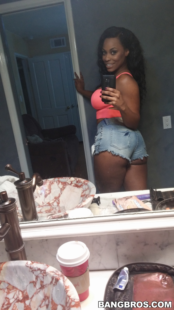 Stunning ebony Tori Taylor exposes her big boobs and rides a black boner porn photo #428438077