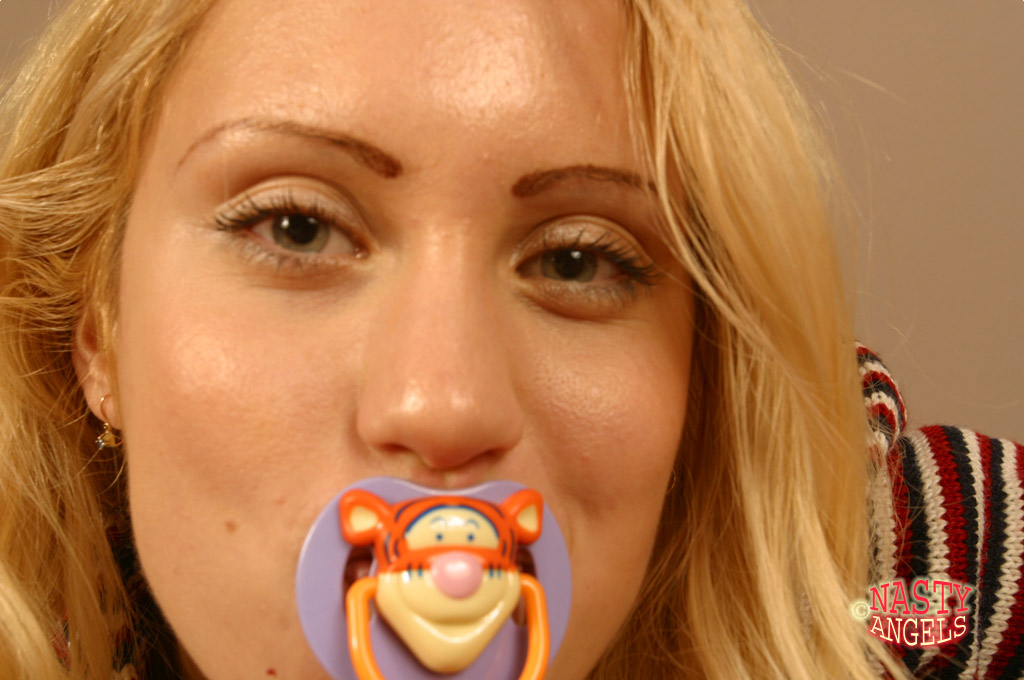 Spoiled blonde teen with a baby's soother in her mouth gets stripped naked foto porno #424727045