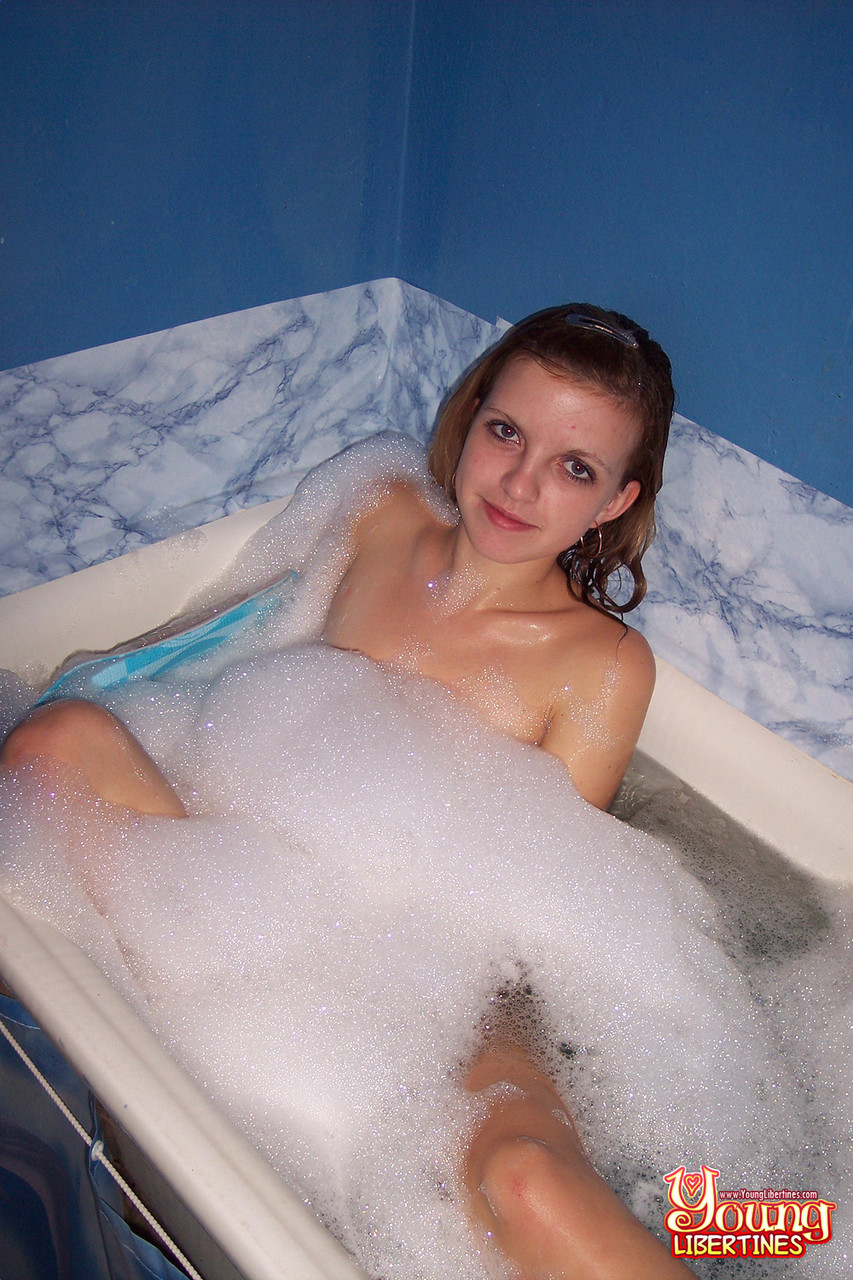 Tiny boobed teen Simona getting finger fucked during a bubble bath porn photo #422560234