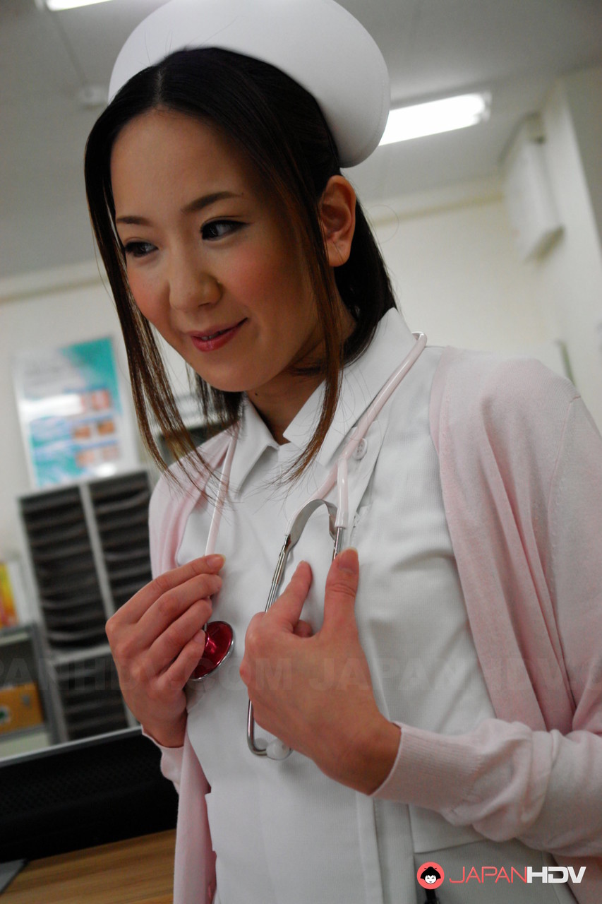Cute Asian Nurse Mika Kojima Gives A Blowjob While Exposing Her Tits