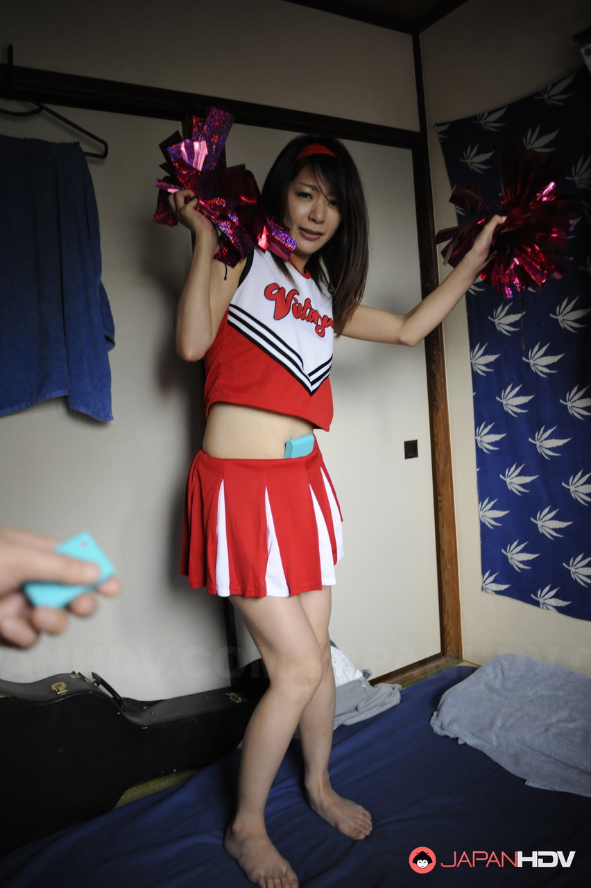 Japanese cheerleader Tomomi Matsuda hikes her dress and masturbates before sex foto porno #422778914