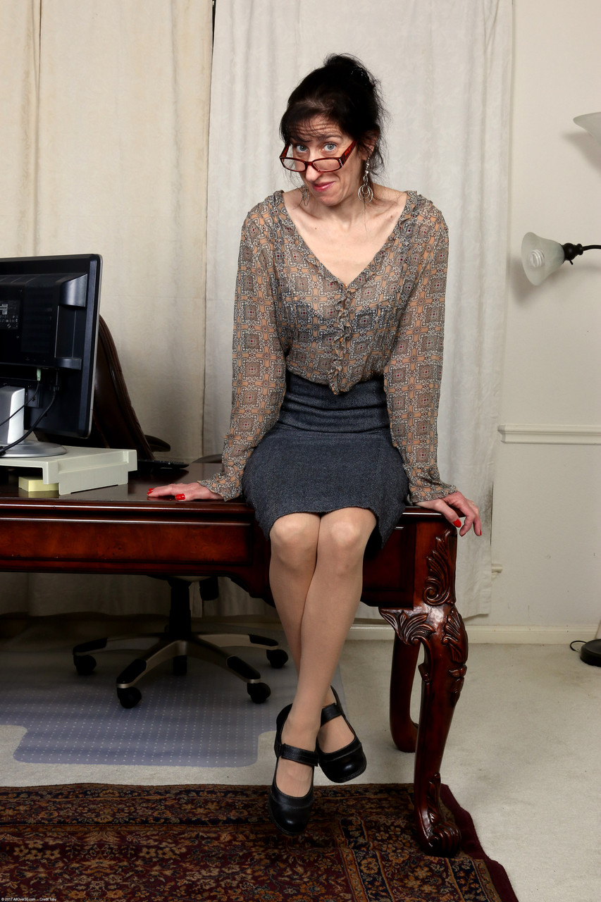 Mature Lady Penny Jones Unveils Her Tiny Tits Her Hairy Twat In Her Office