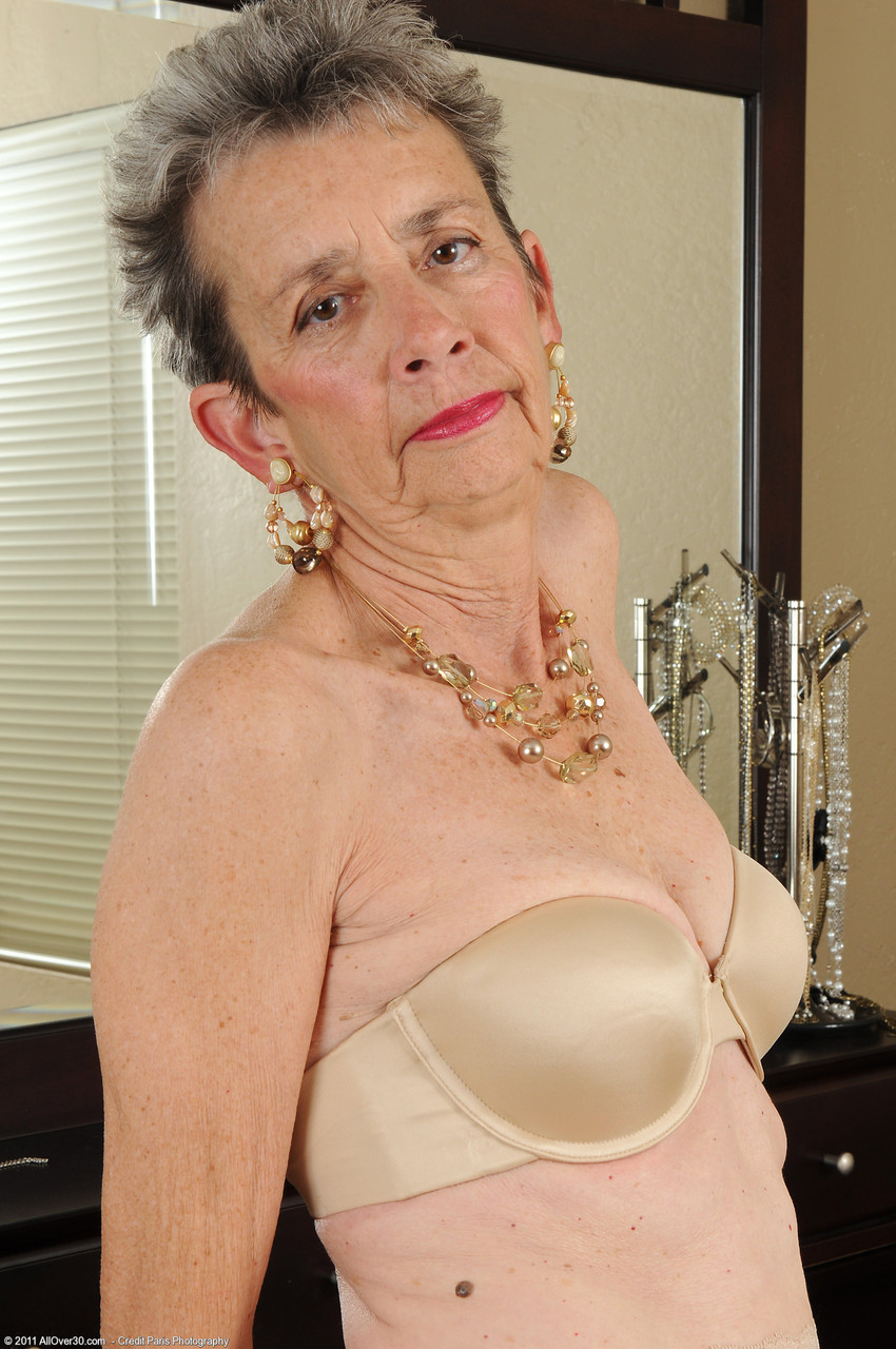 Slim Granny Cassie Doffs Her Dress And Flaunts Her Bushy Vagina