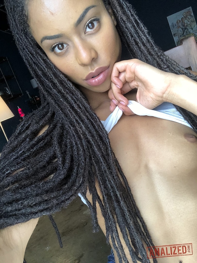 Beautiful ebony teen Kira Noir reveals her hot ass and tiny tits in a solo photo porno #423423714