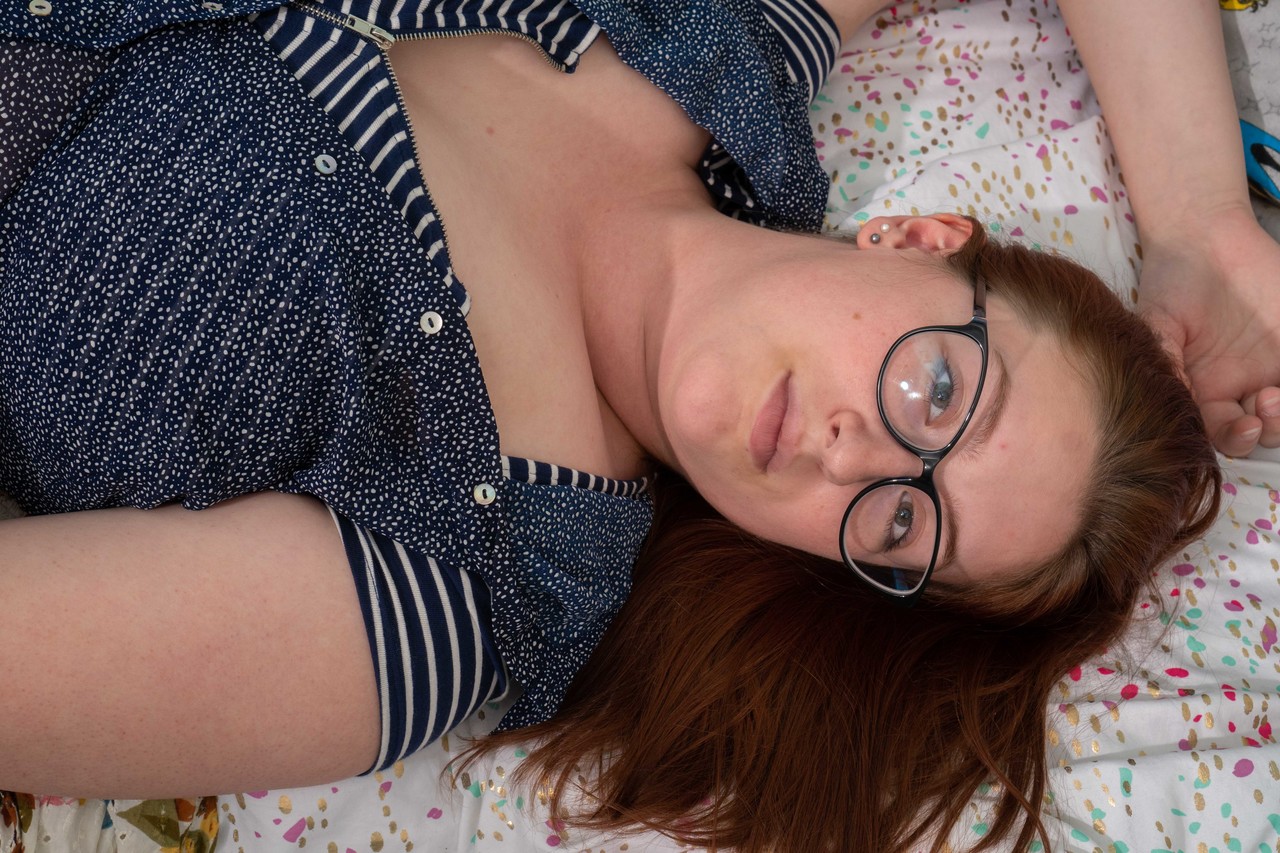 Chubby redheaded geek Breanna reveals her huge breasts and toys her bush porn photo #422676949