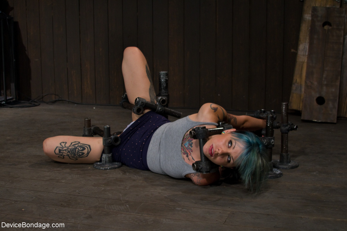 Sexy tattooed babe Krysta Kaos gets abused and tortured on the floor porn photo #425665523