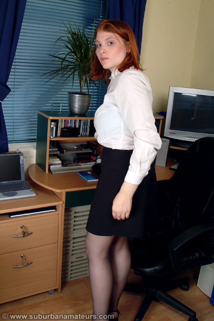Amateur redheaded secretary Kelly M flaunts her big boobs and toys herself porn photo #423866246